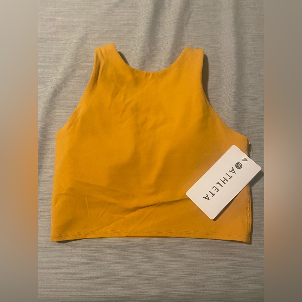 Athleta yellow high neck sports bra.